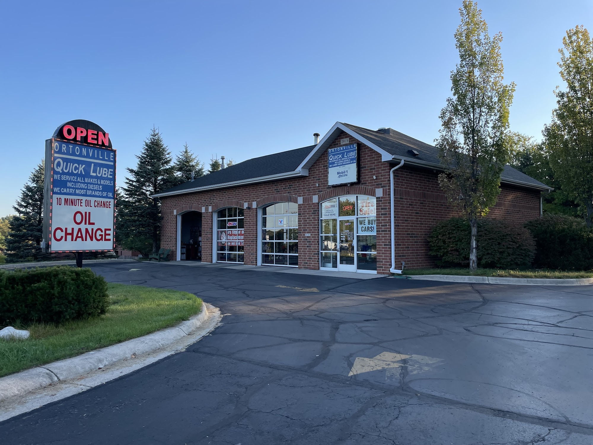 Front entrance and sign at Ortonville Quick Lube